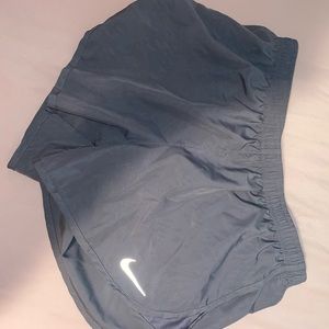 barely worn nike shorts, missing string